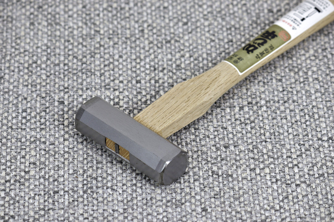 300gmGennou-Hammer close up of octagonal head and showing the metal pin used to join the white oak handle to the head