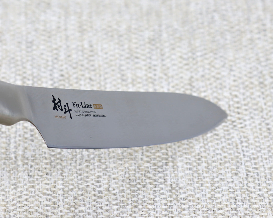 Fit Line 180mm Gyuto (Chef) knife, blade angled down from left to right. All Stainless-steel kitchen knife, made in Japan