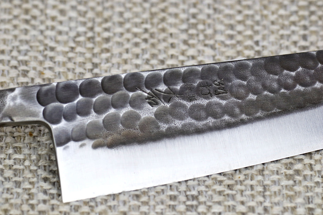Ohishi Aogami 2 Kurouchi/Tsuchime 180mm Gyuto (Chef) kitchen knife close up of engraving and hammered finish