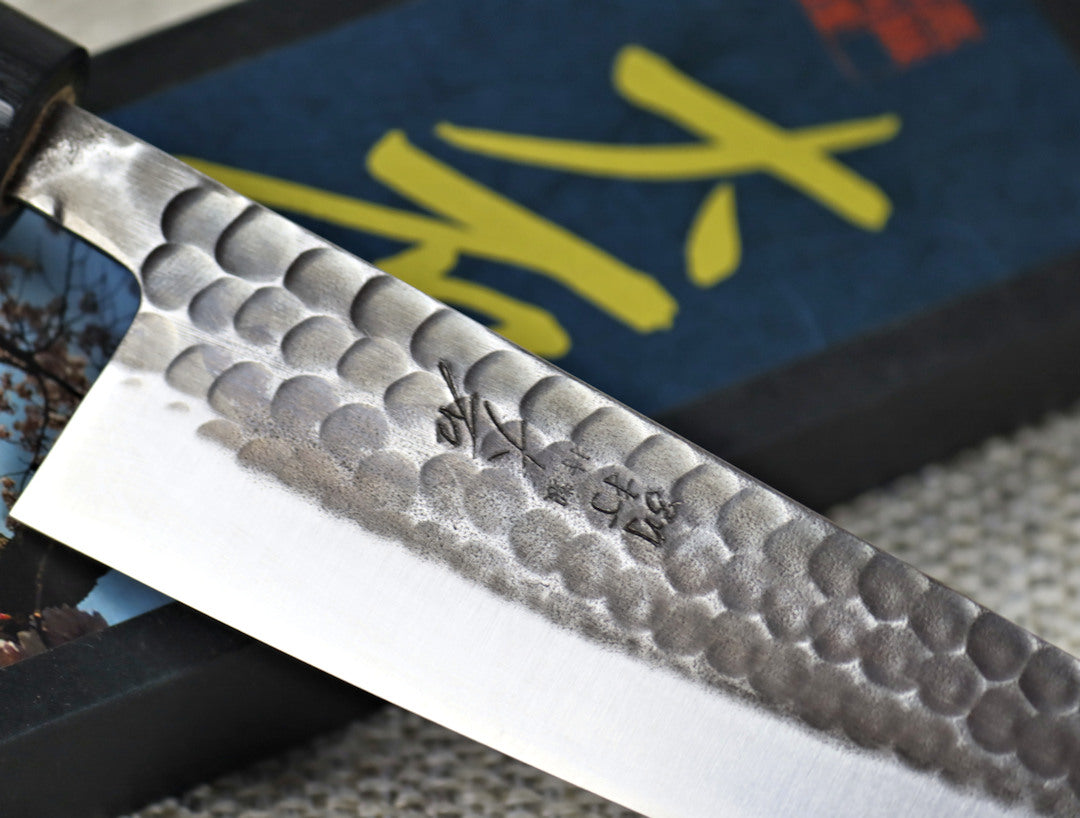 Ohishi Aogami 2 Kurouchi/Tsuchime 180mm Gyuto(Chef) kitchen knife close up of blade showing the engraving and hammered finish