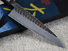 Ohishi Aogami 2 Kurouchi/Tsuchime 135mm Petty (Utility) Kitchen Knife close up of the blade showing the slightly red tinted kurouchi hammered finish